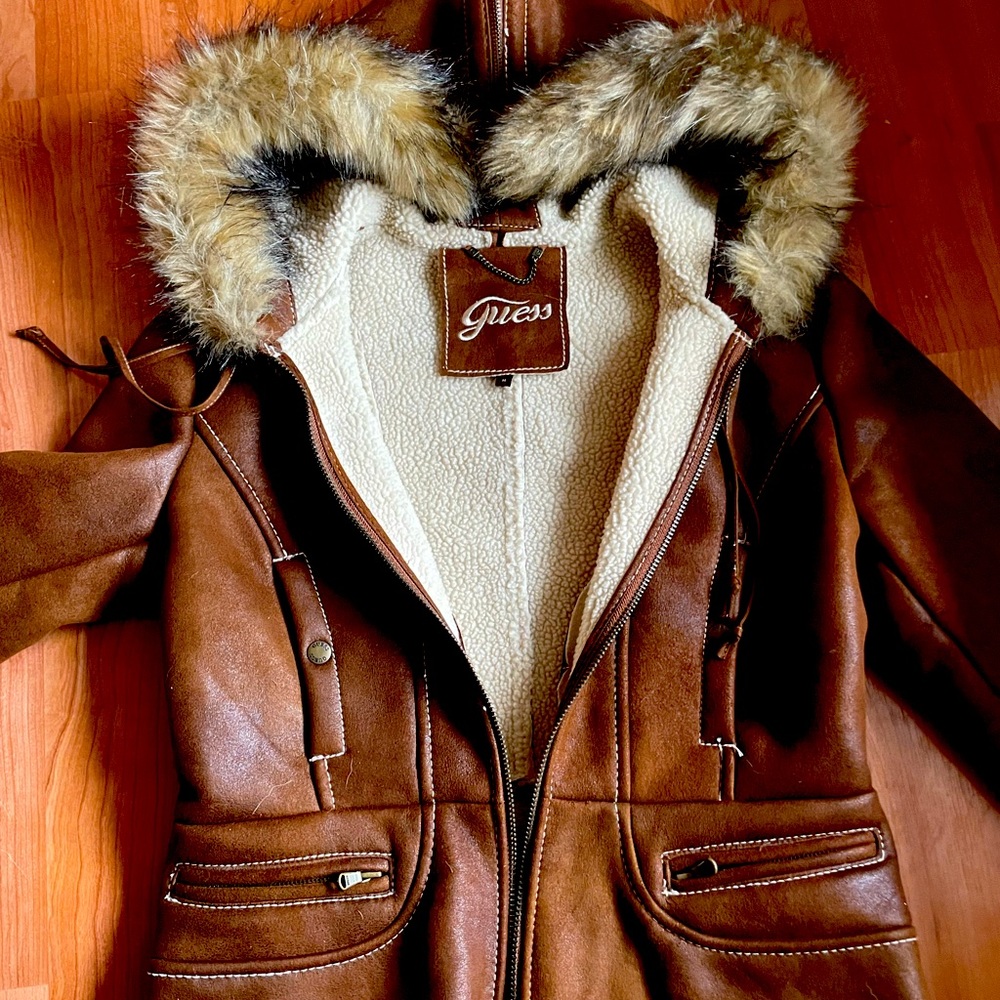 Women’s Guess Fall Jacket hood jacket. Fur trim, zipper hood.Fleece lined.